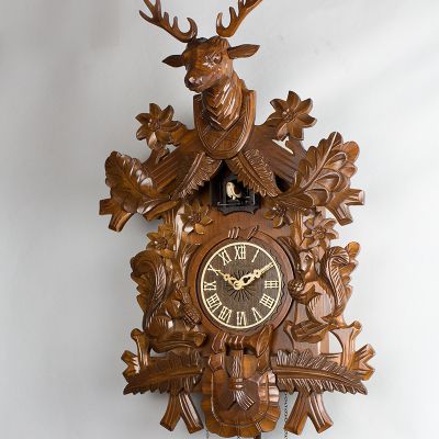 木雕的鹿头钟挂客厅哪个位置？-图1